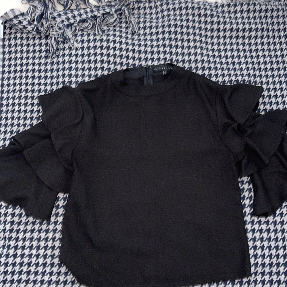 Endless rose black shirt with zip closure up back and ruffle sleeve detail